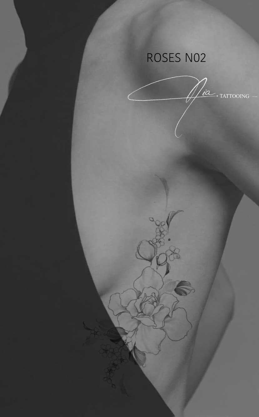 Roses N02 — fine line rose tattoo · Nia Tattooing